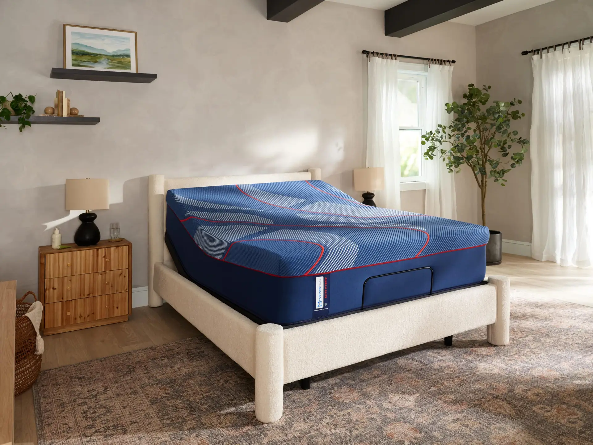Sealy Albany Ii Medium Hybrid 1 Sealy Albany II Medium Hybrid mattress on a stylish bed frame in a well-lit room with decorative elements, showcasing its premium memory foam and cooling technology features.