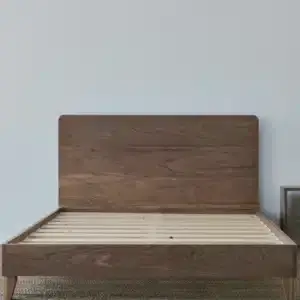 Avocado City bed frame with walnut headboard, showcasing a minimalist design and wooden slats, featured on Healthy ZZZ's e-commerce page for sleep products.