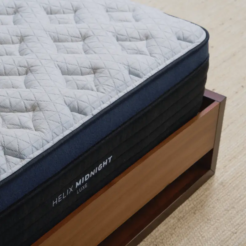 Helix Midnight Luxe 4 Helix Midnight Luxe mattress with quilted top and supportive base, showcasing premium design for enhanced sleep quality.