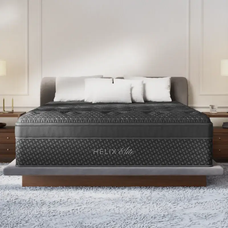Helix Elite mattress on a stylish bed frame with plush pillows, showcasing luxury sleep solutions at Healthy Zzz’s Sleep Store in Hamilton, OH.
