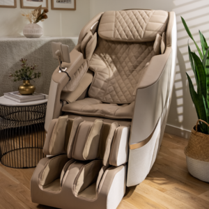 Positive Posture® DualTech 4D Dual Track Massage Chair in slate color, featuring a sleek design and multiple massage zones, set in a cozy living space with plants and decorative elements.