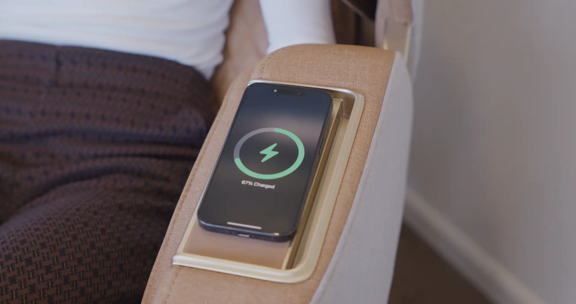 Positive Posture Solara 16 Wireless phone charging feature on Positive Posture Solara massage chair, displaying 50% charge indicator.