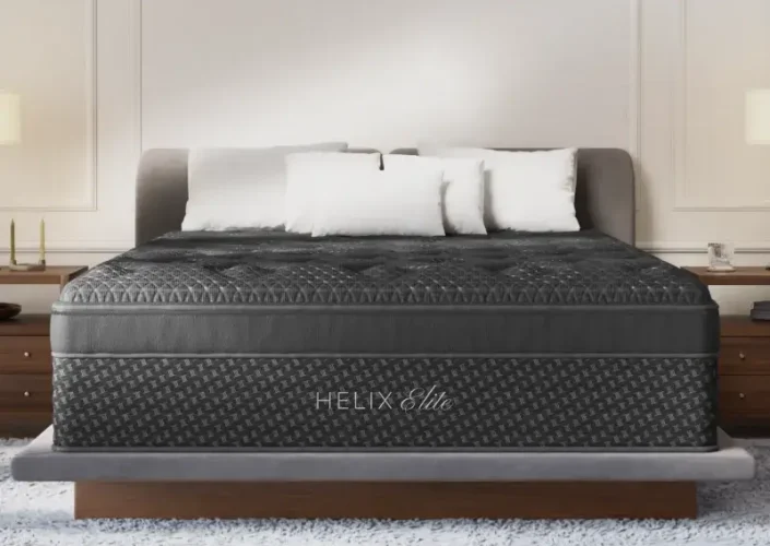 Helix Twilight Elite hybrid mattress featuring a luxurious design with firm support, positioned on a stylish bed frame in a modern bedroom setting.